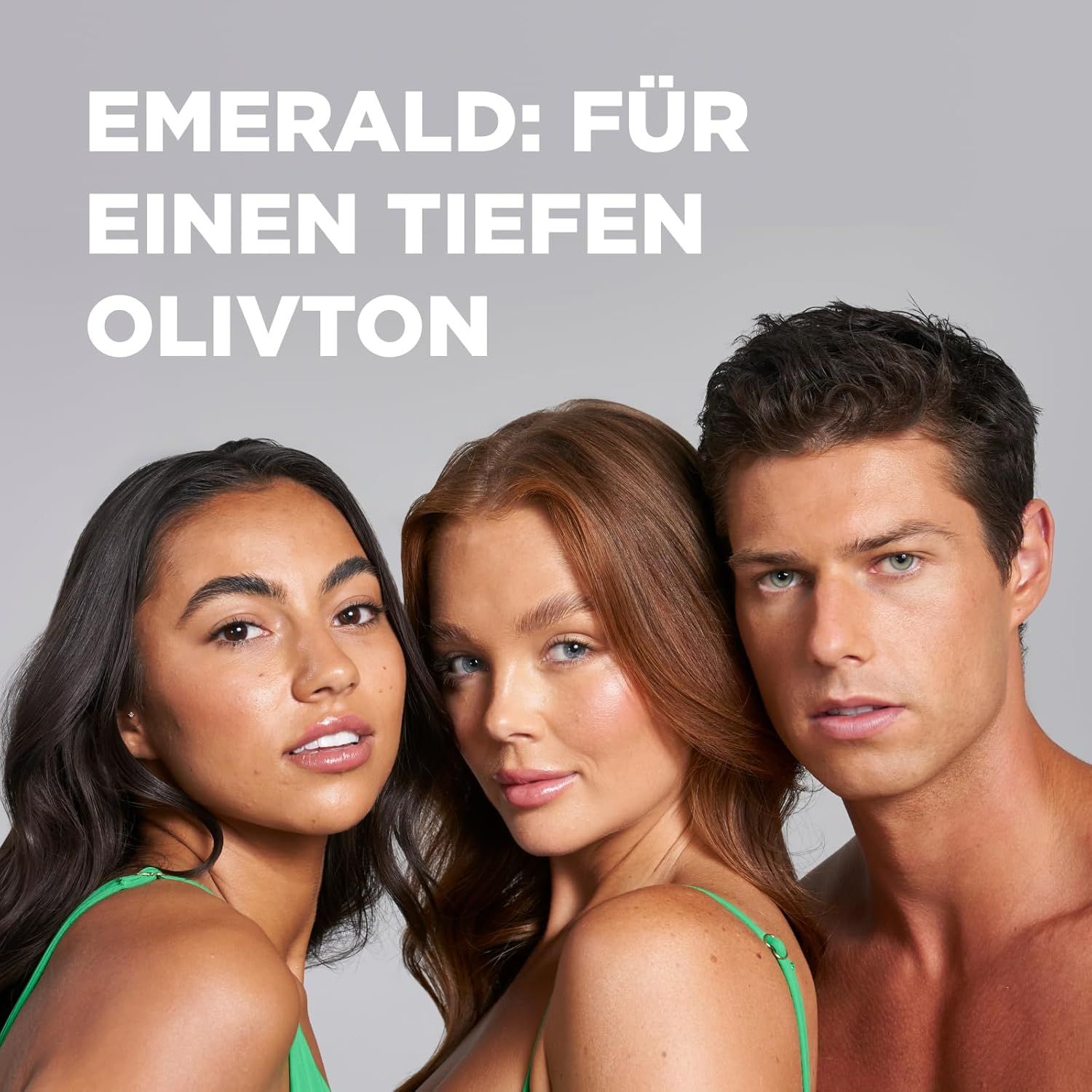 Tre persone. Testo: Emerald: Per un tono oliva intenso. Tonalità della pelle diverse. Prodotto verde e bianco sullo sfondo.