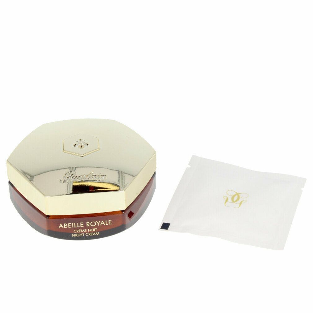 Vaso di crema notte con coperchio e bustina. Scritta: Abeille Royale, Crème Nuit, Guerlain. Scritta e coperchio dorati.