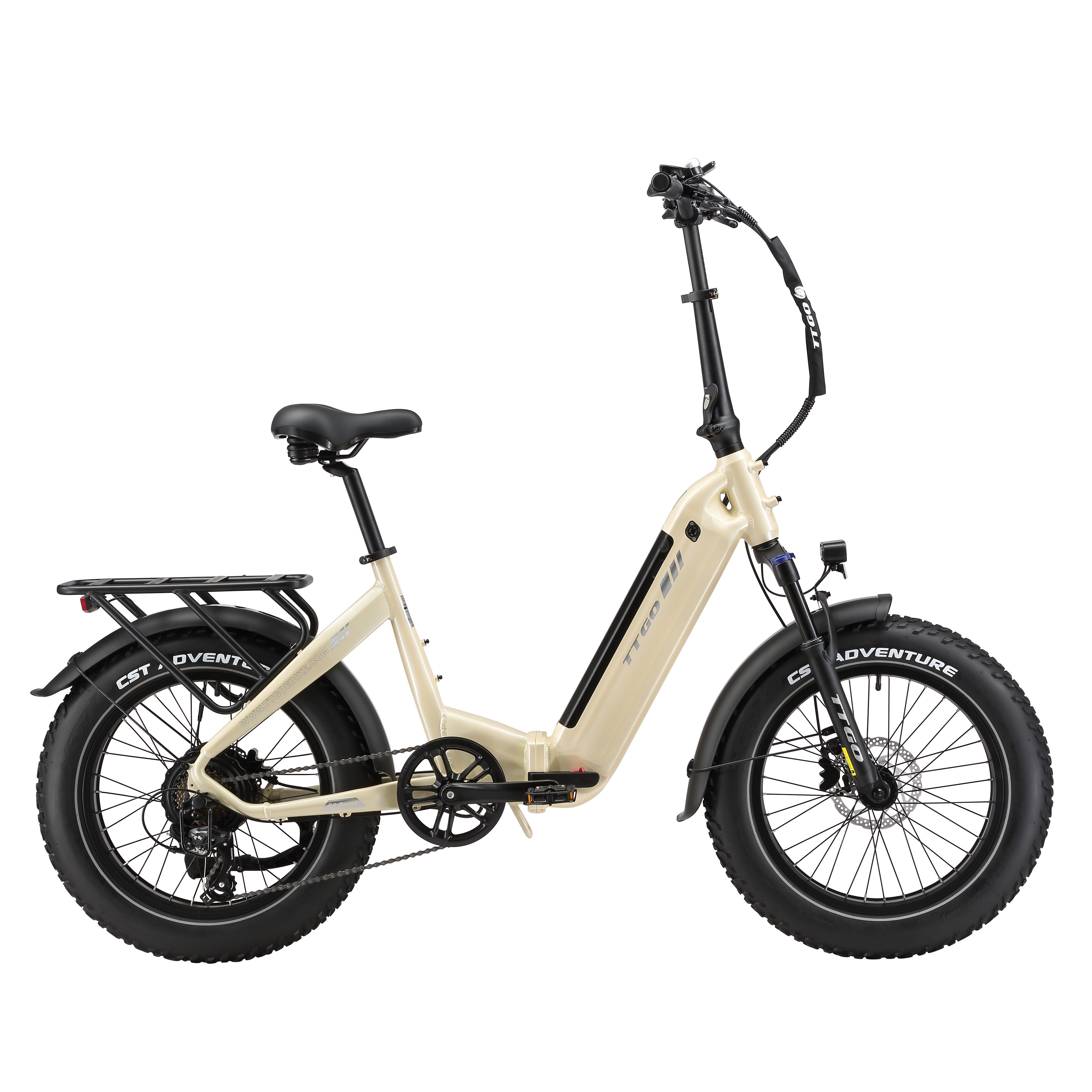 E-bike pieghevole beige con pneumatici neri. Sella nera, portapacchi. Scritta "ADVENTURE" sullo pneumatico.