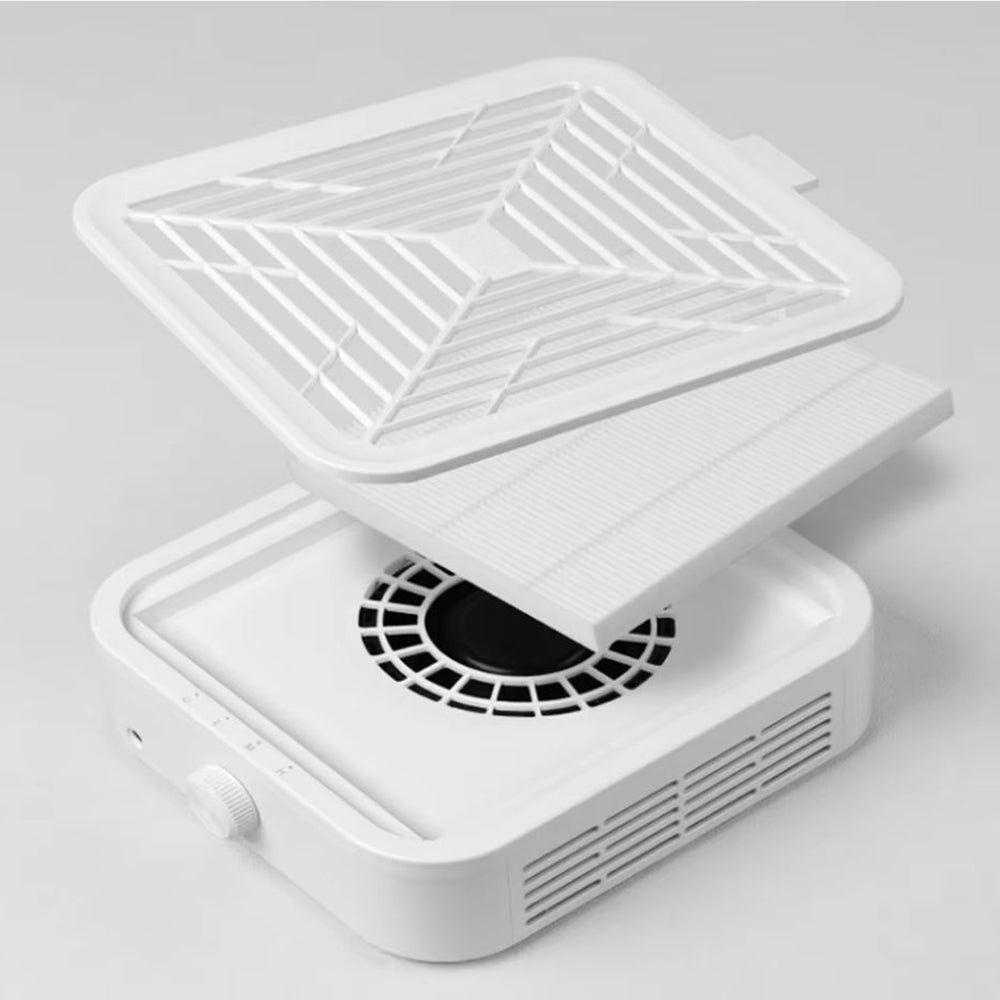 Aspiratore bianco con filtro rimosso. Filtro e dispositivo visibili. Logo: LCI Cosmetics.