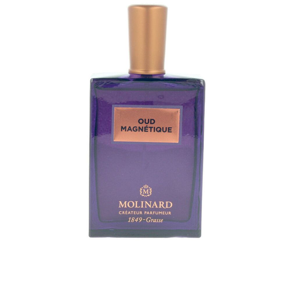 Flacone blu scuro con tappo color rame. Scritta: Oud Magnetique, Molinard. Forma rettangolare.