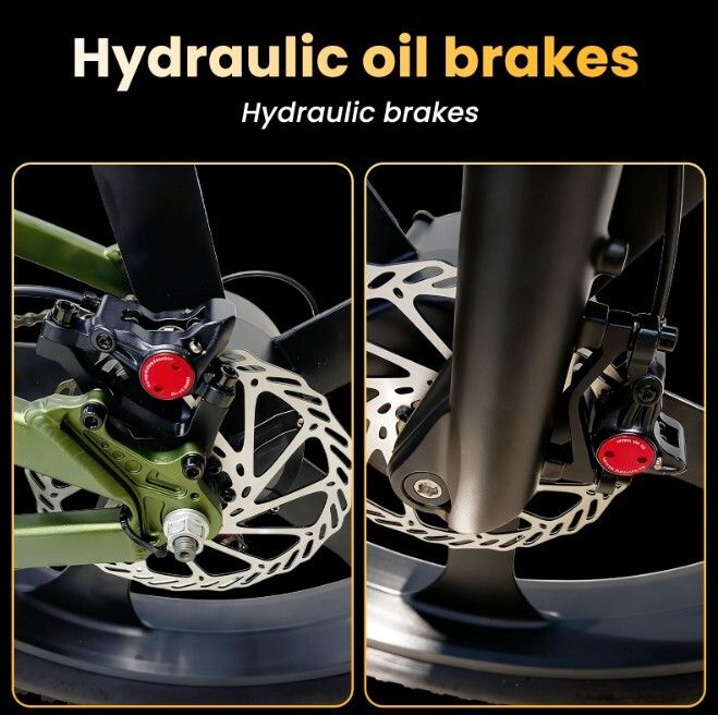 Primo piano dei freni idraulici a olio di una mountain bike. Accenti rossi sui freni.