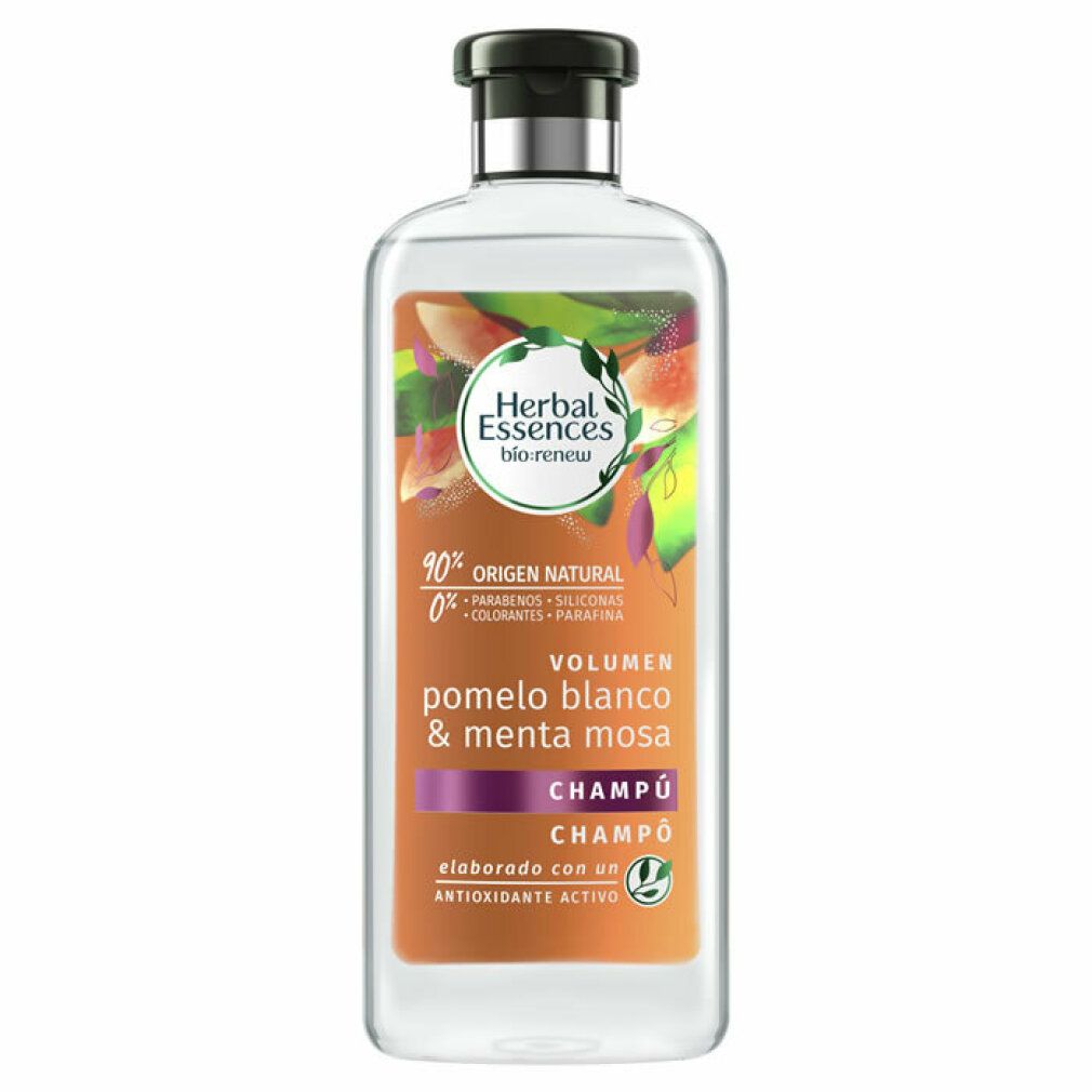 Flacone di shampoo trasparente con tappo nero. Etichetta con nome del prodotto, ingredienti e logo. Volume/Pomelo Blanco & Menta Mosa.