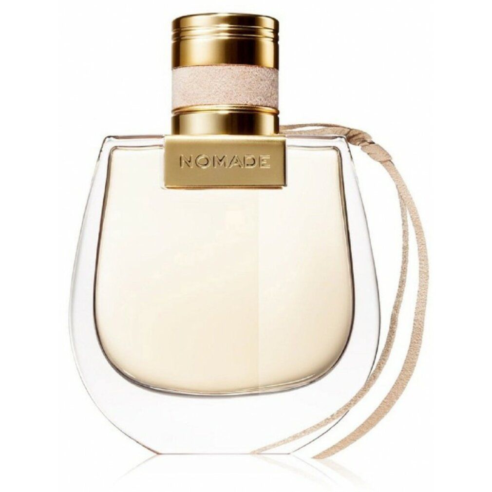 Flacone di profumo con tappo dorato e scritta "NOMADE". Flacone in vetro con nastro beige.