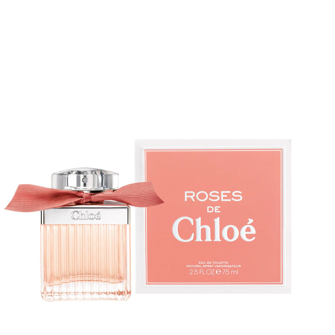 Flacone di profumo con fiocco rosa e confezione. Scritta "Roses de Chloé".