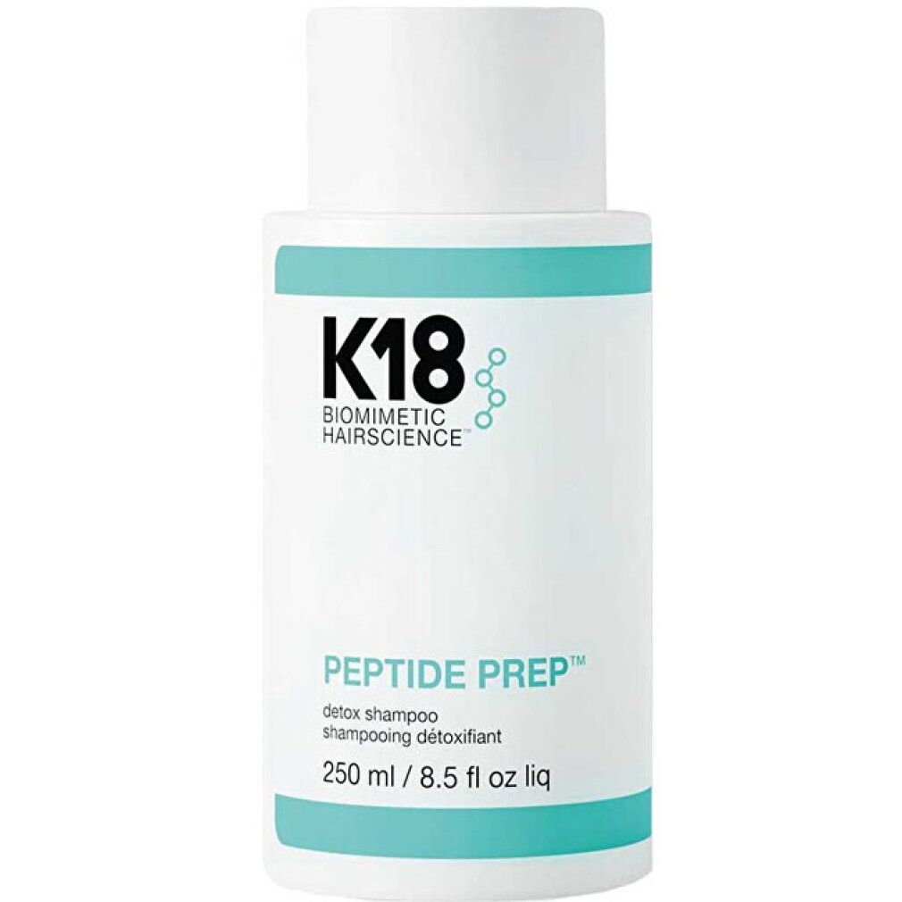 Piccolo flacone bianco con logo K18. Nome prodotto: Peptide Prep. Volume: 250 ml. Con dosatore.