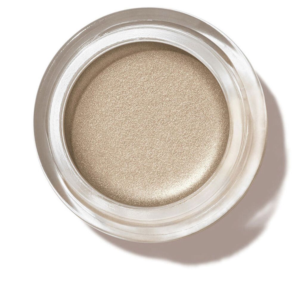 Vasetto di ombretto in crema, beige chiaro. Scritta visibile: Revlon Colorstay Crème Eye Shadow.