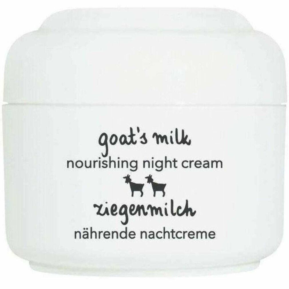 Vasetto bianco con scritta "goat's milk nourishing night cream" e Ziegenmilch. Illustrazioni di capre nere. Testo tedesco.