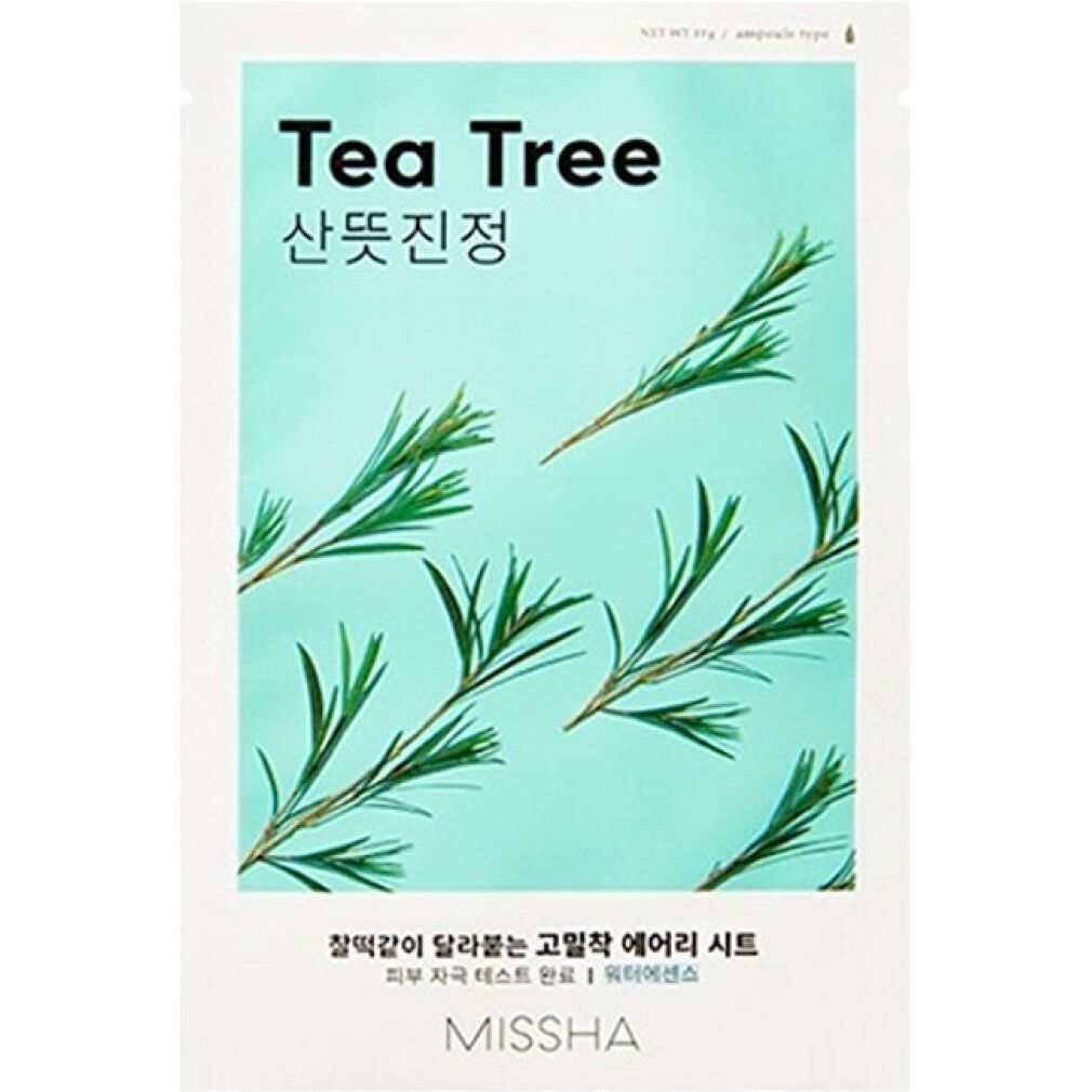 Confezione bianca con sfondo verde e motivo tea tree. Testo: Tea Tree, caratteri coreani, MISSHA.