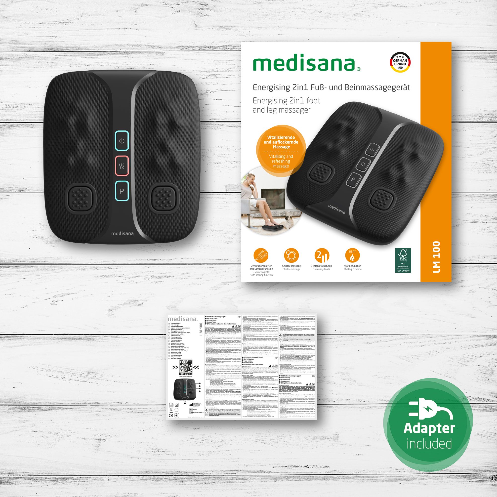 Massaggiatore per piedi, confezione, manuale di istruzioni e adattatore di alimentazione. Marchio: medisana. Modello: LM 100.