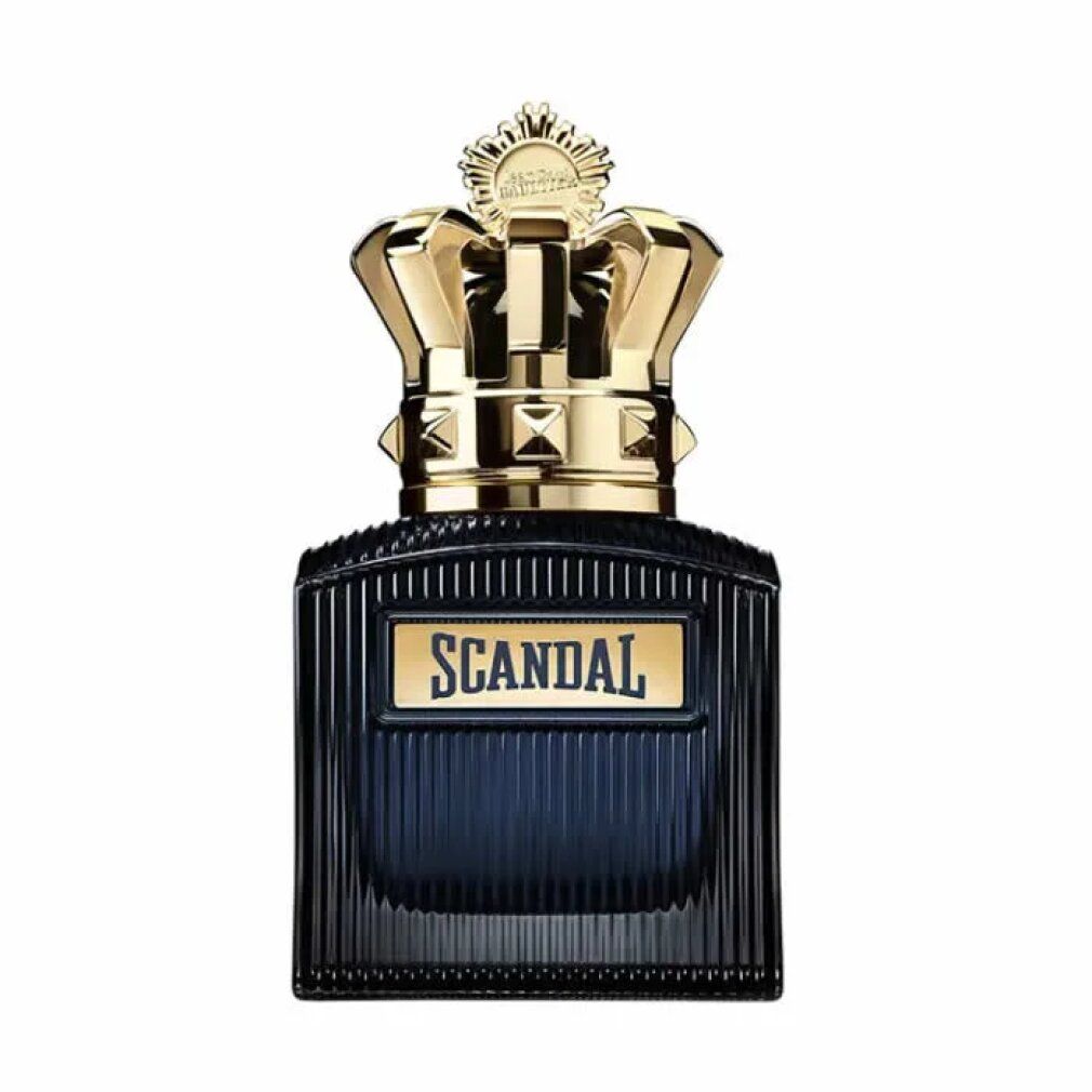Flacone blu scuro con tappo a corona dorata. Scritta "SCANDAL" su scudo rettangolare.