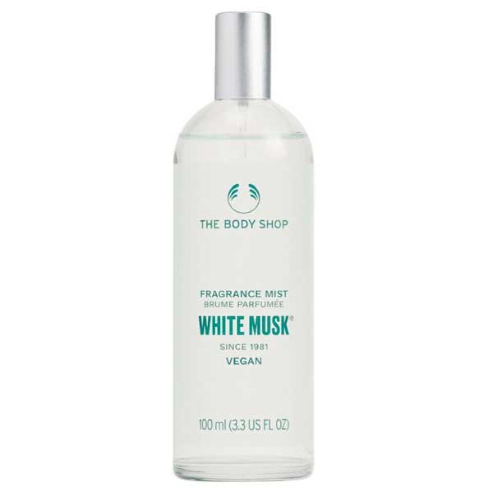 Flacone trasparente con vaporizzatore argentato. Etichetta con logo, testo: White Musk, Fragrance Mist, Vegan. Volume: 100 ml.