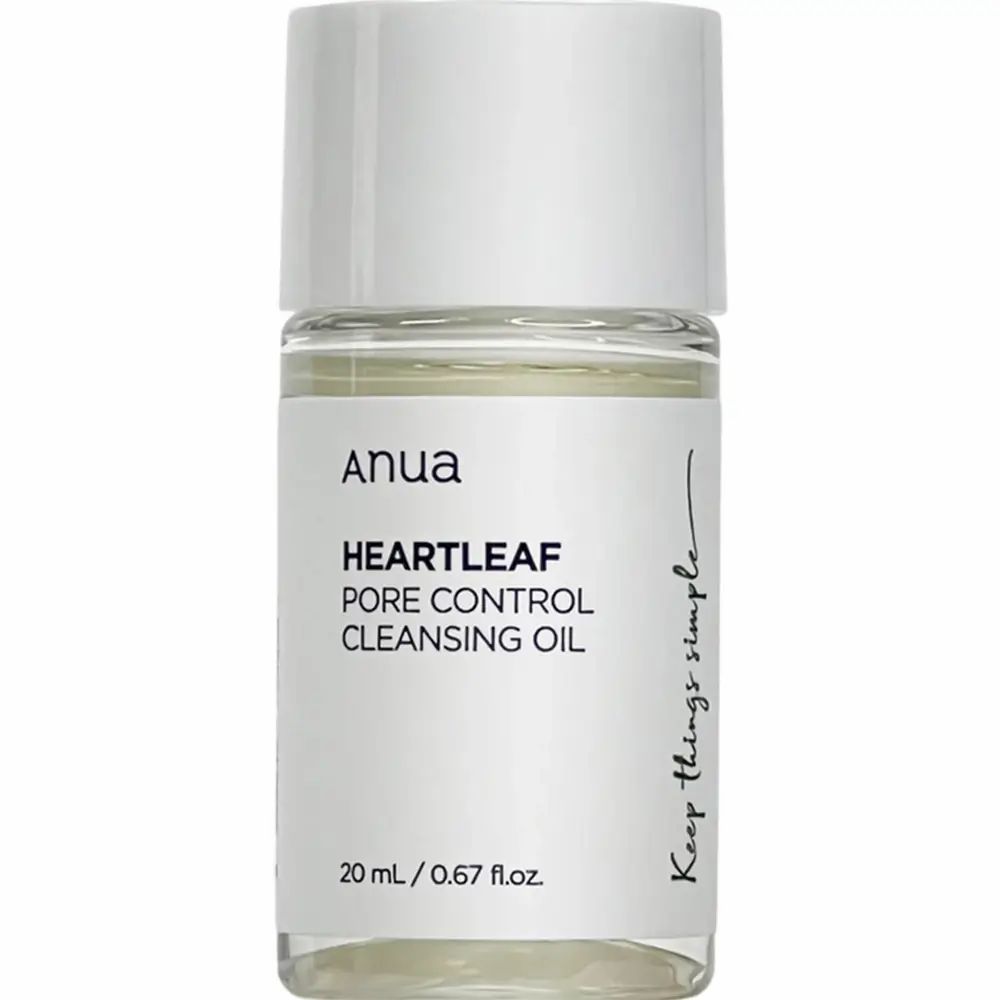 Flacone cilindrico trasparente con tappo bianco. Contiene liquido chiaro. Scritte: Anua, Heartleaf Pore Control Cleansing Oil, 20 ml.