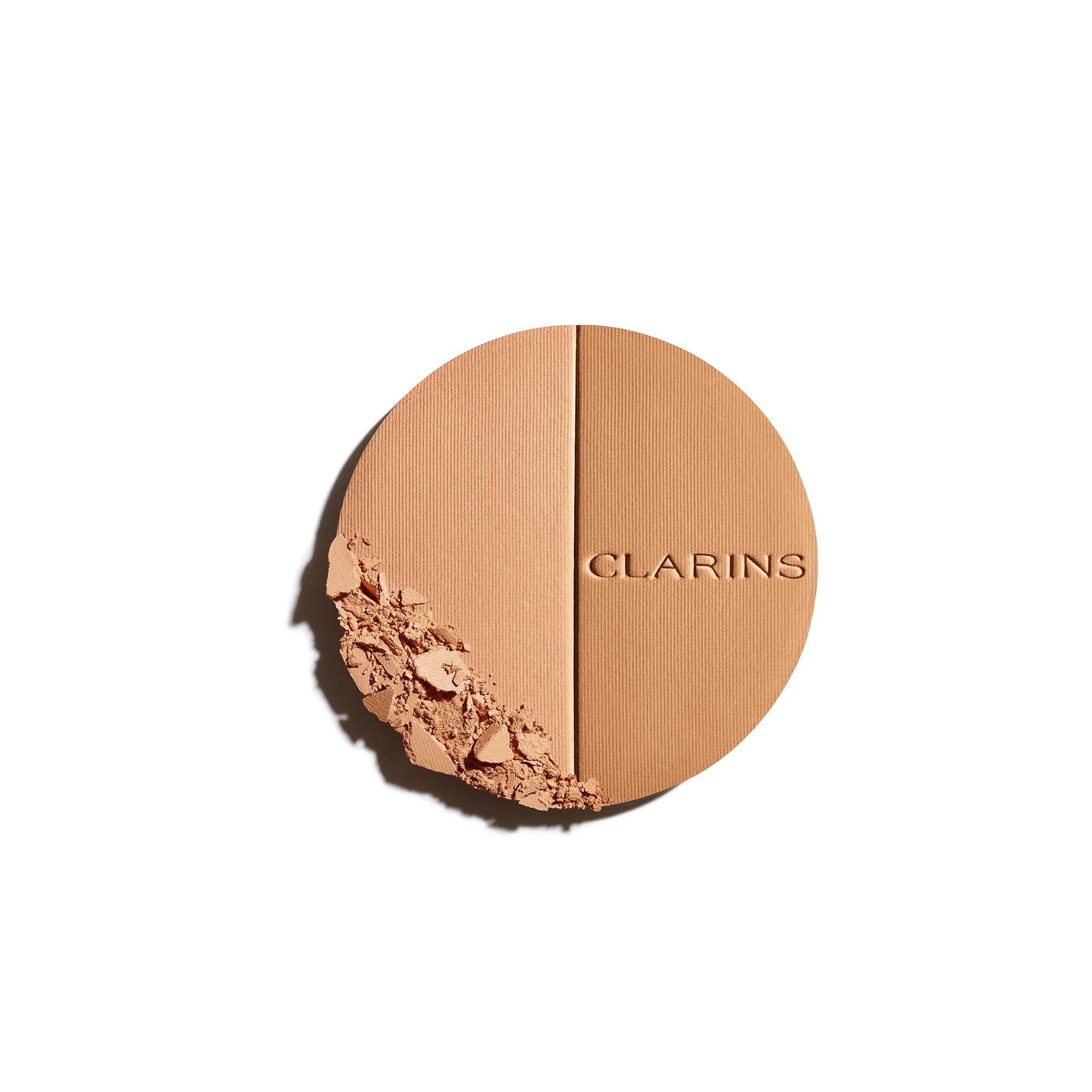 EVER BRONZE duo poudre bronzante 01. Compatto in polvere rotondo bicolore. Una metà più chiara, l'altra più scura. Logo CLARINS.