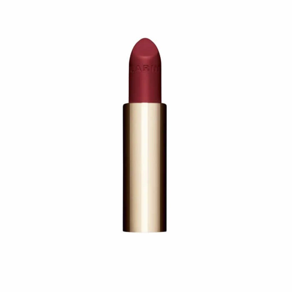 Rossetto rosso in un astuccio dorato. Incisione "CLARINS" sul rossetto.