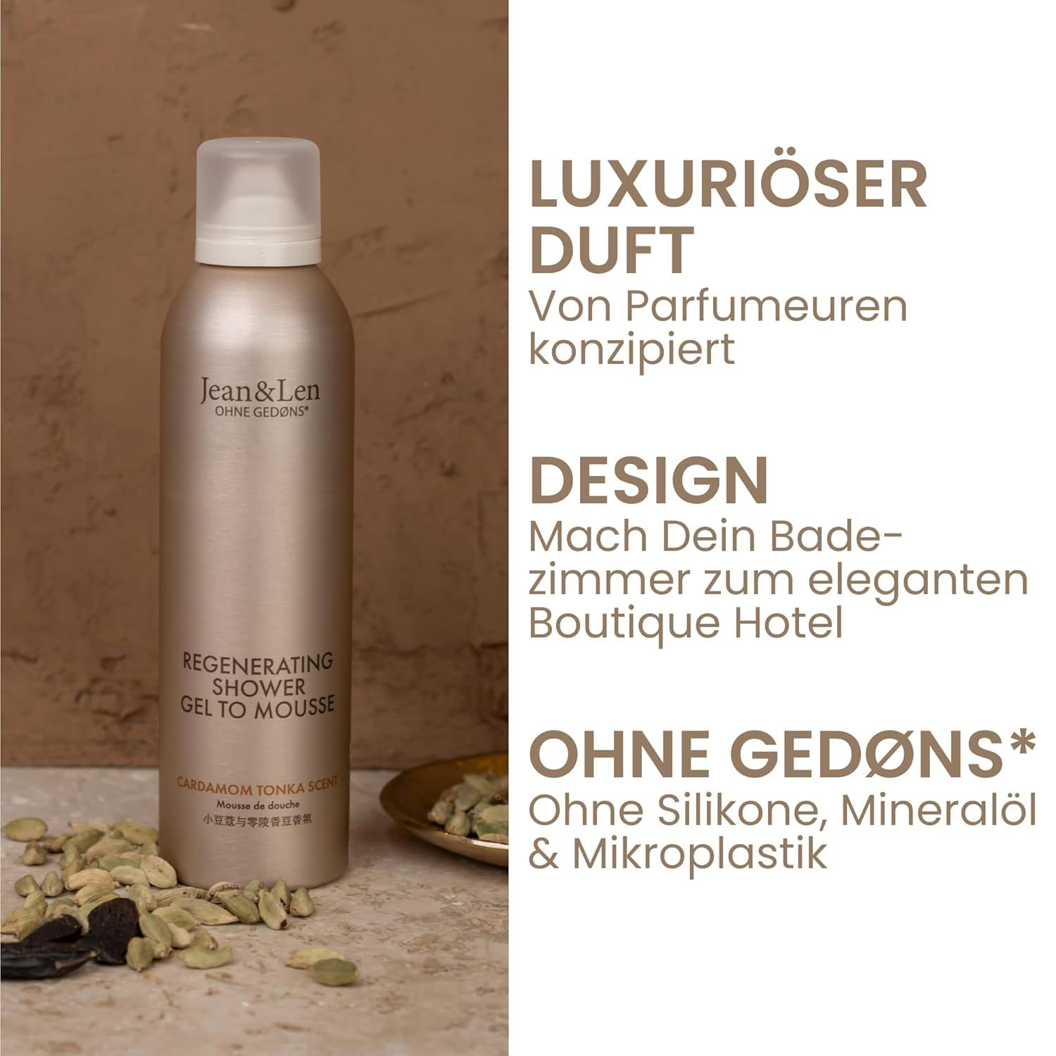 Flacone beige con tappo bianco. Testo: Jean & Len, Regenerating Shower Gel To Mousse, Cardamom Tonka. Spezie accanto.