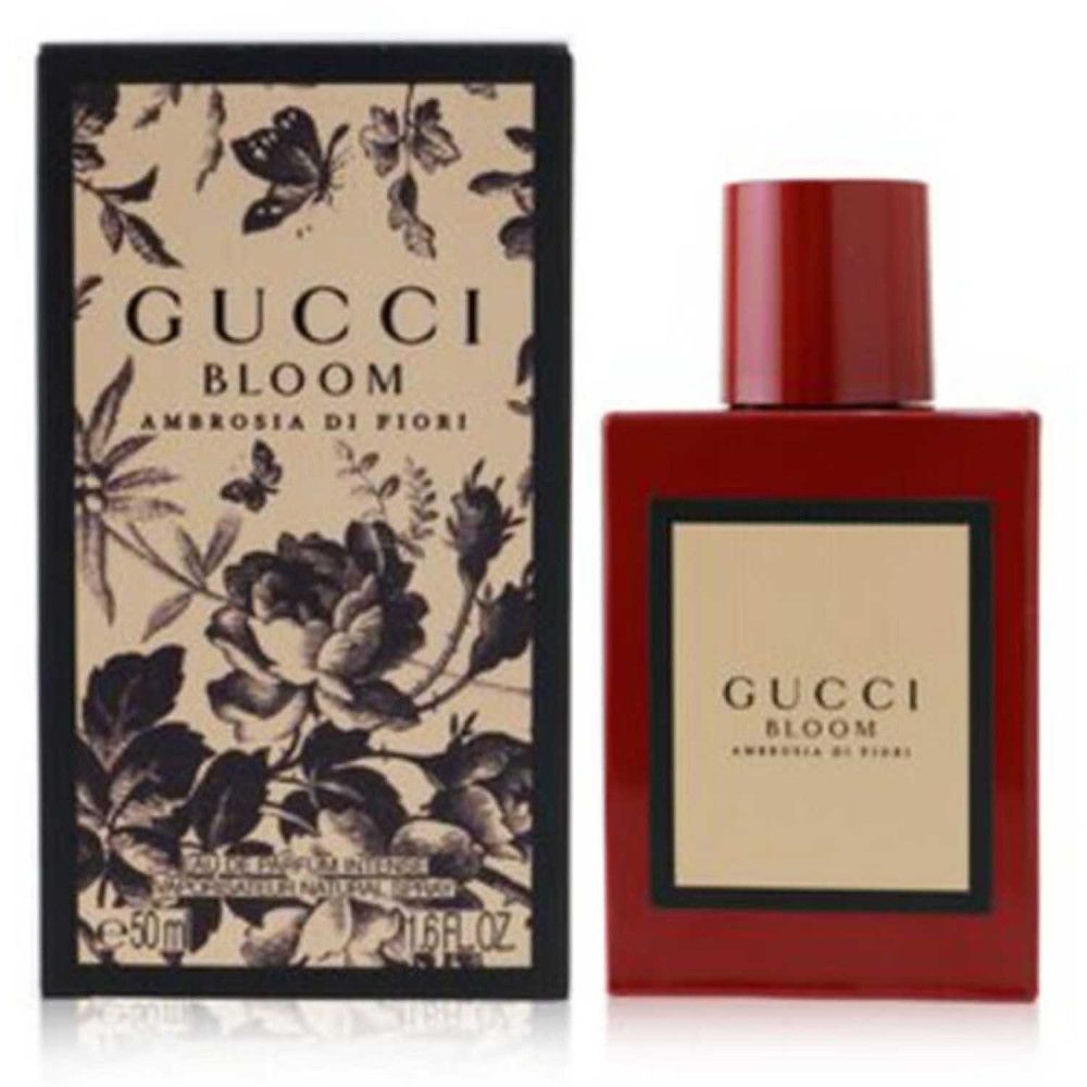 Flacone e confezione Gucci Bloom Ambrosia di Fiori. Confezione con motivo floreale. Flacone rosso.