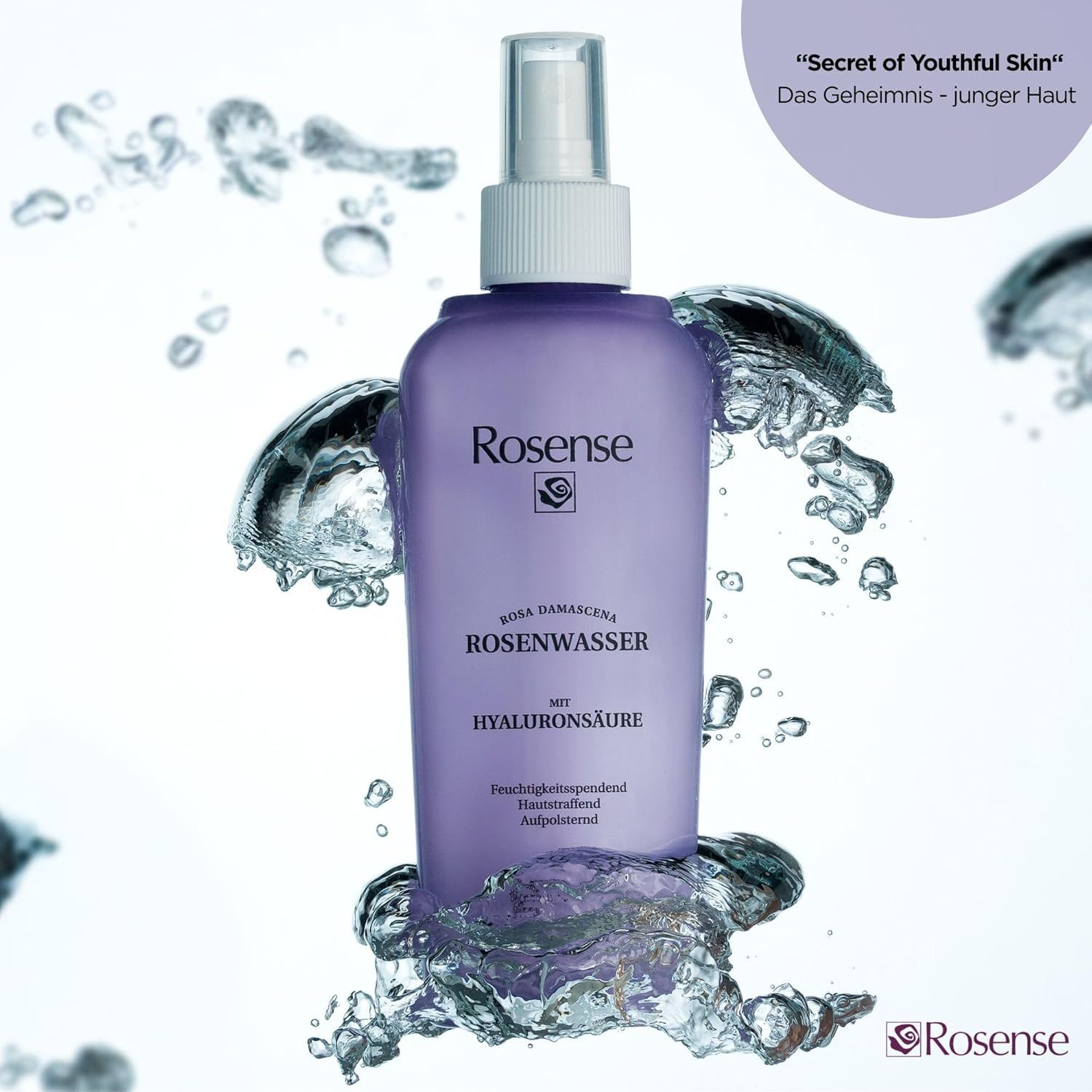 Spray Rosense viola in acqua. Testo: Acqua di rose con acido ialuronico. Secret of Youthful Skin.