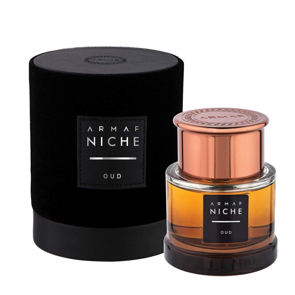 Flacone in vetro e confezione cilindrica nera. Scritta: ARMAF NICHE OUD.
