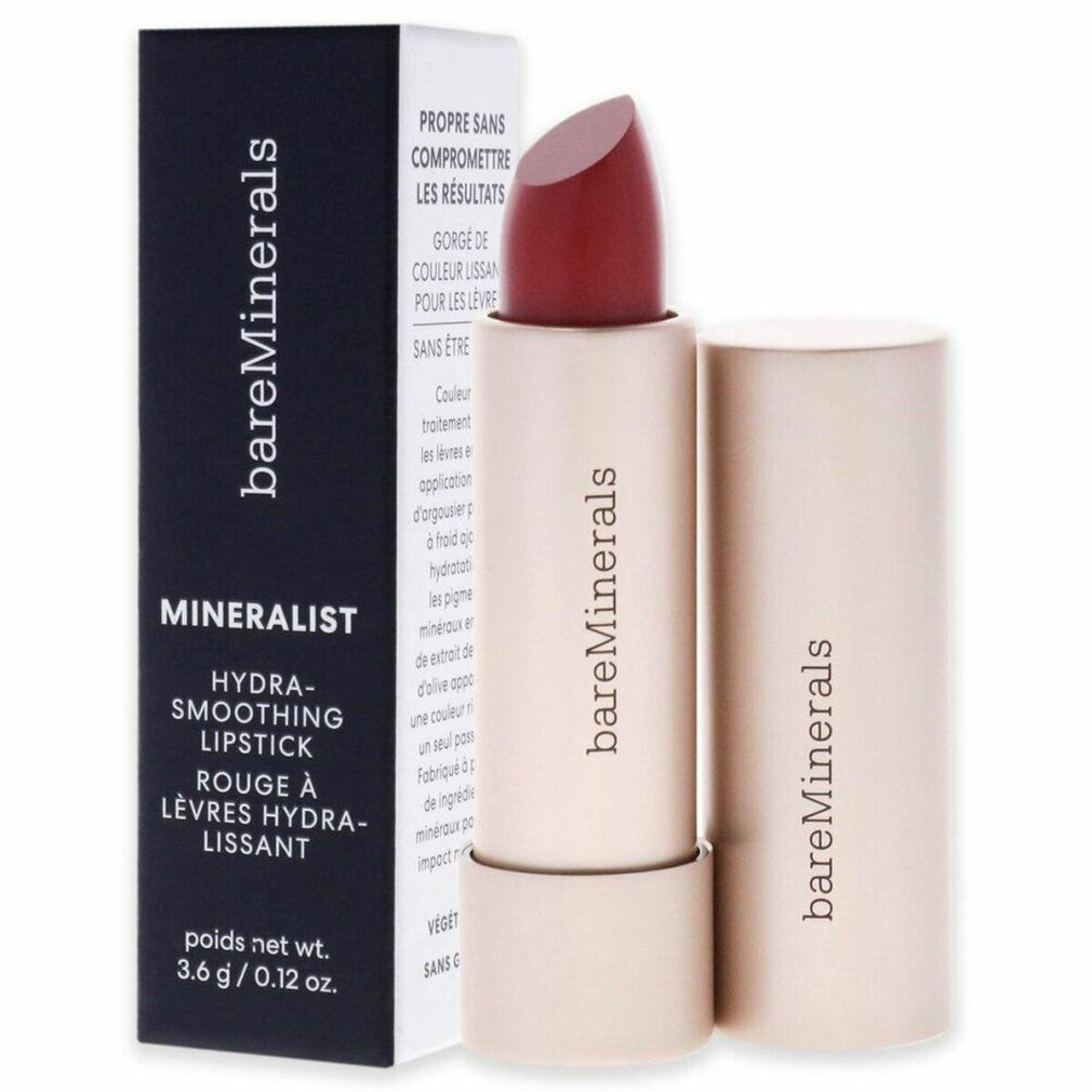 Rossetto BareMinerals Mineralist nella confezione. Rossetto rosso, confezione aperta. Scritta: "Hydra-Smoothing Lipstick".