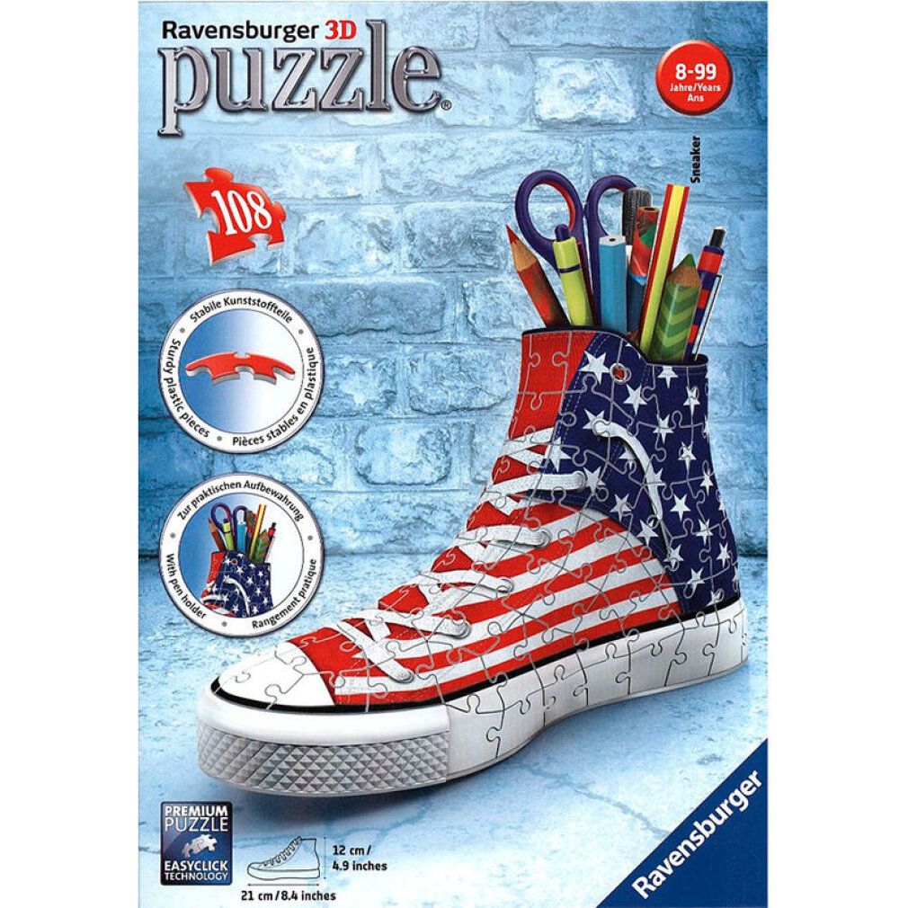Puzzle 3D Ravensburger, scarpa americana. Pezzi formano una scarpa con bandiera americana. Contiene penne e forbici. Confezione.