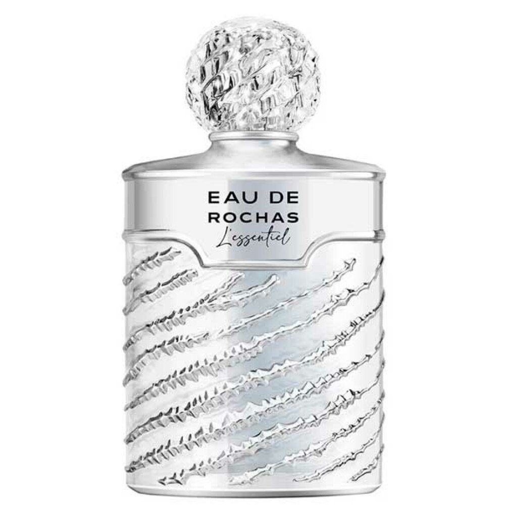 Flacone argentato con superficie scanalata e tappo. Scritta: Eau de Rochas L'Essentiel.