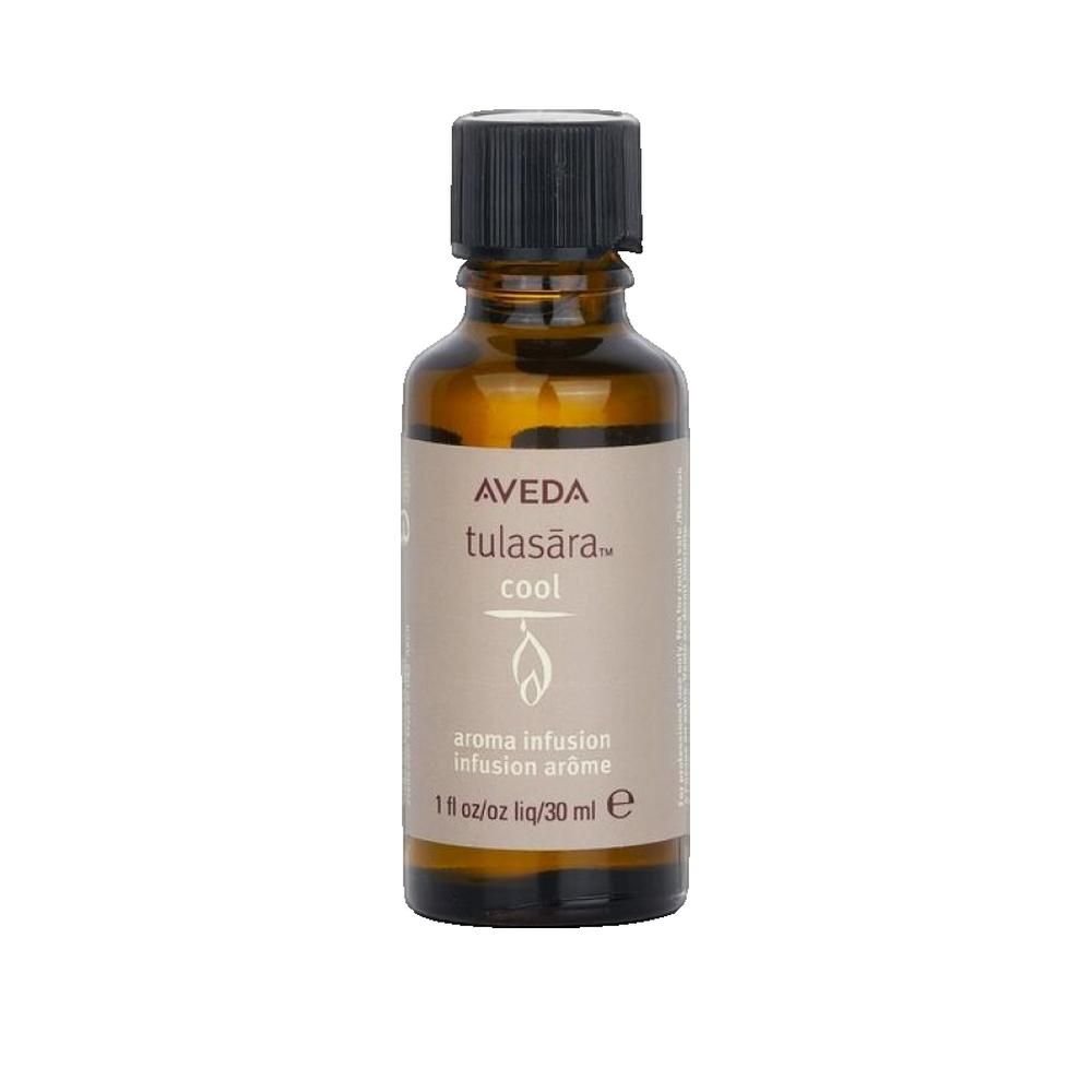 Flacone di vetro marrone con tappo nero. Etichetta con "AVEDA tulasara cool" e "aroma infusion". 30 ml.