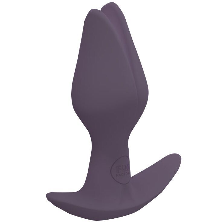 Tappo anale grigio scuro a forma di fiore, visto di lato.