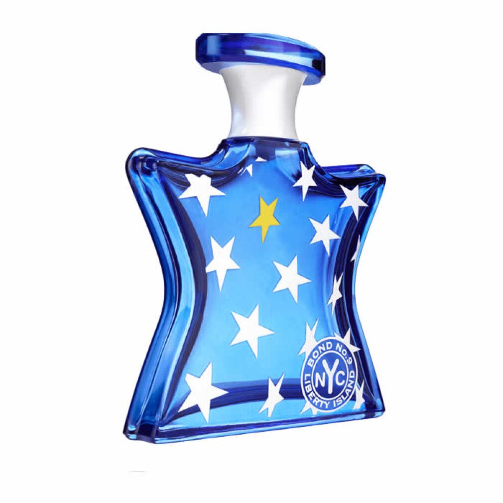 Flacone di profumo blu con stelle bianche e stella gialla. Scritta: Bond No. 9 NYC Liberty Island.