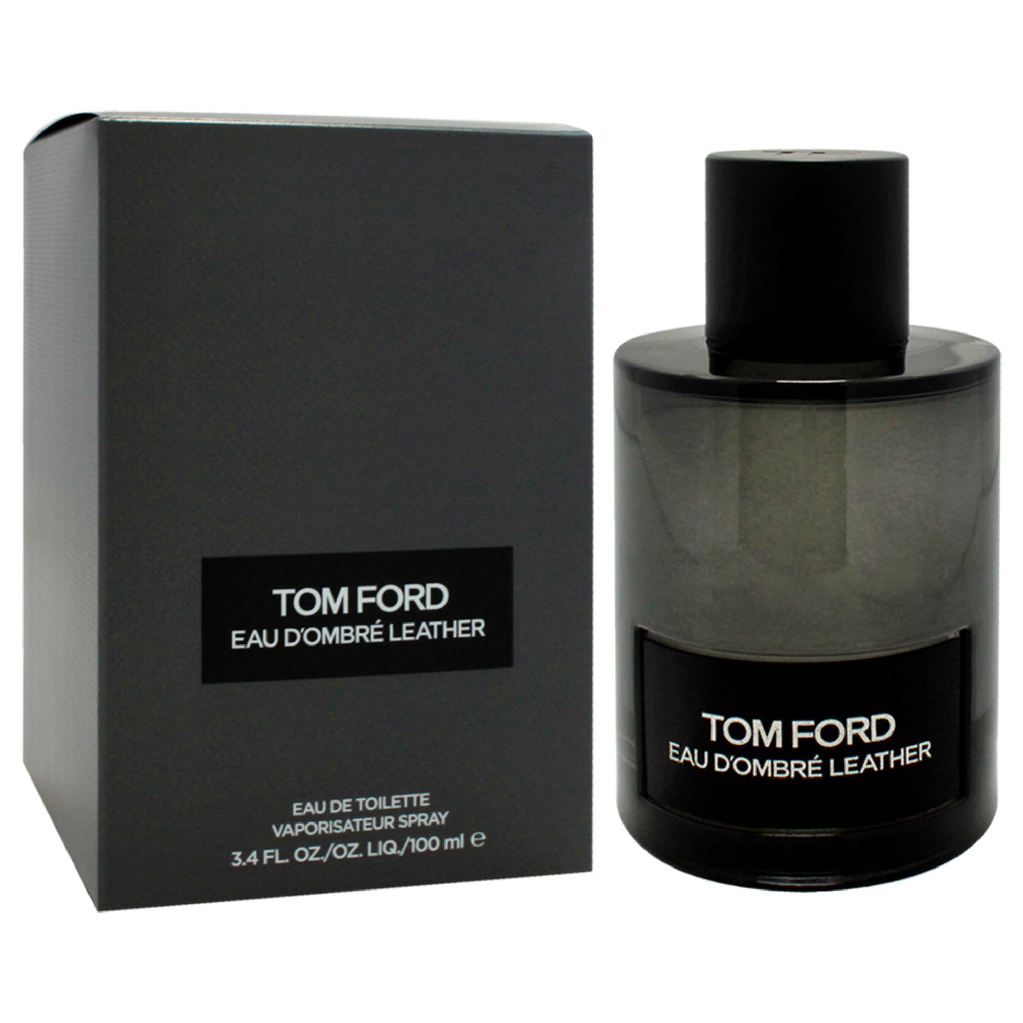 Flacone in vetro grigio con tappo nero e confezione nera. Scritta: TOM FORD EAU D'OMBRÉ LEATHER.