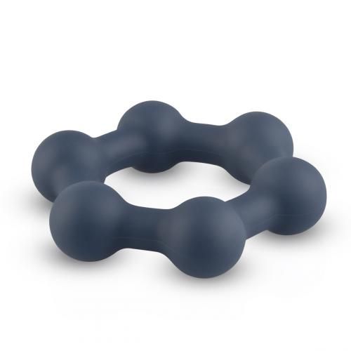Due anelli penieni blu scuro in silicone con sfere d'acciaio. Sei elementi sferici formano un anello.