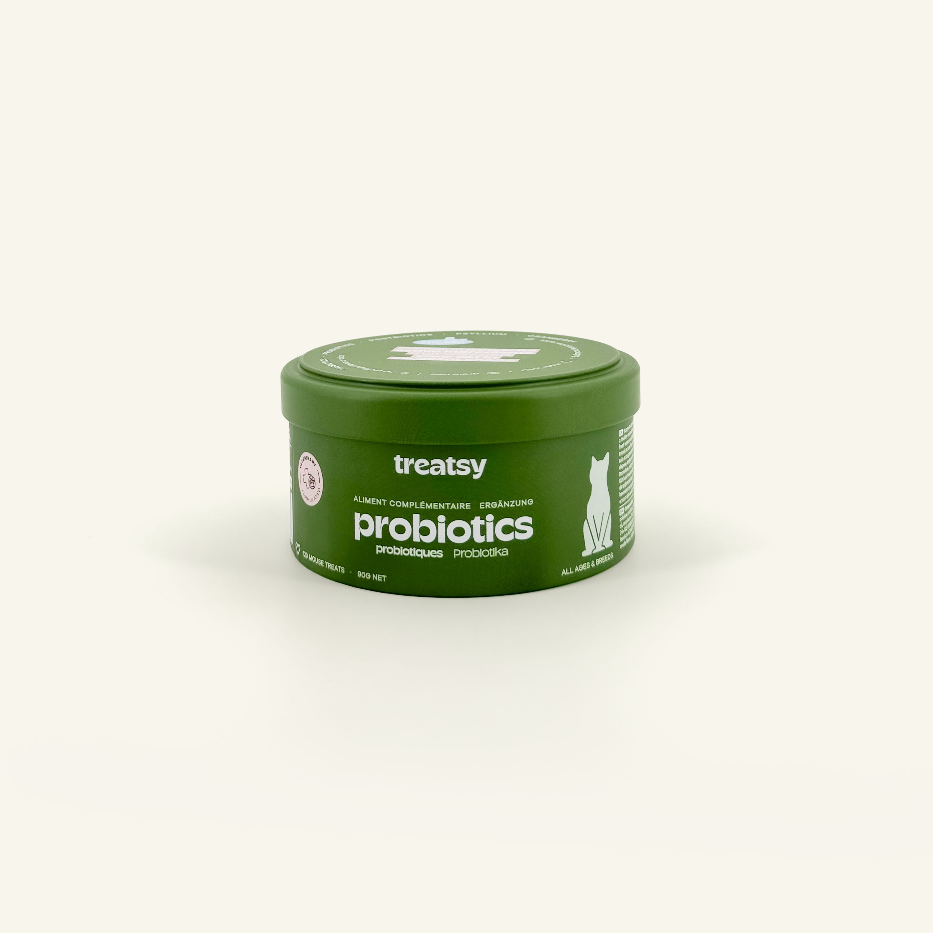 Barattolo verde con "Treatsy Probiotics". Scritta bianca e sagoma di gatto.