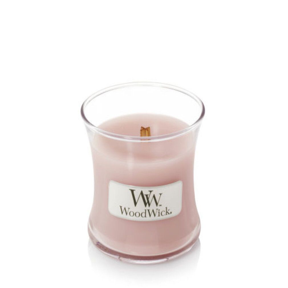 Candela a forma di clessidra con stoppino in legno. Cera rosa in contenitore di vetro. Etichetta con logo. Senza coperchio.