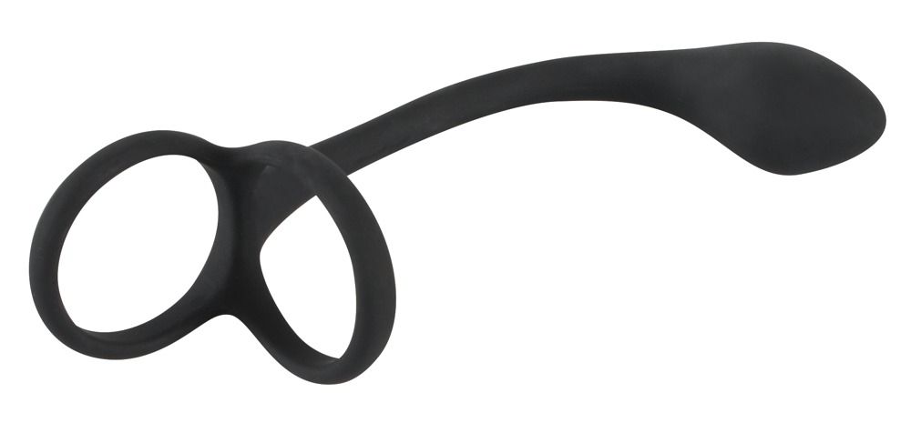 Anello per pene/testicoli nero con plug anale. Parte ad anello e asta allungata con estremità arrotondata.