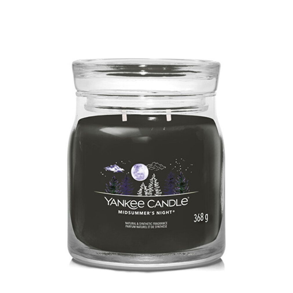 Candela profumata scura in vaso con coperchio. Scritta: Yankee Candle Midsummer's Night, 368 g.