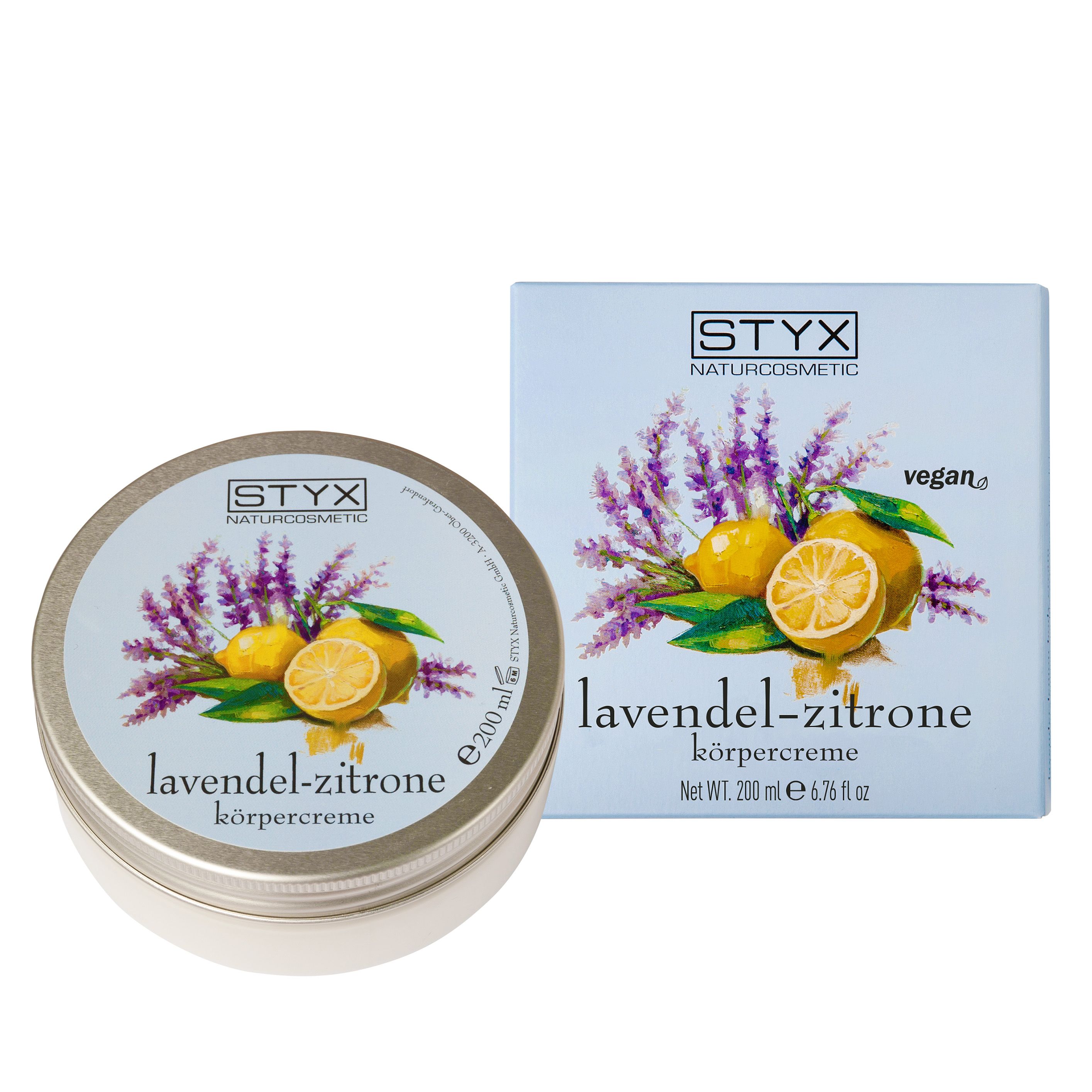 Barattolo e scatola di crema Lavanda-Limone. Scritta: STYX, Lavendel-Zitrone Körpercreme, vegan. Motivo floreale.