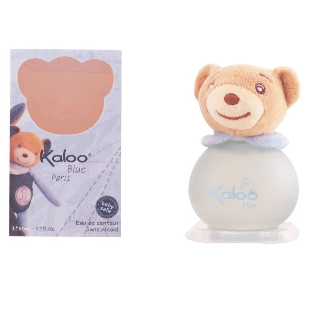 Flacone di profumo con testa di orsetto. Flacone con scritta "Kaloo Blue". Scatola con motivo orsetto e scritta "Kaloo Blue Paris".