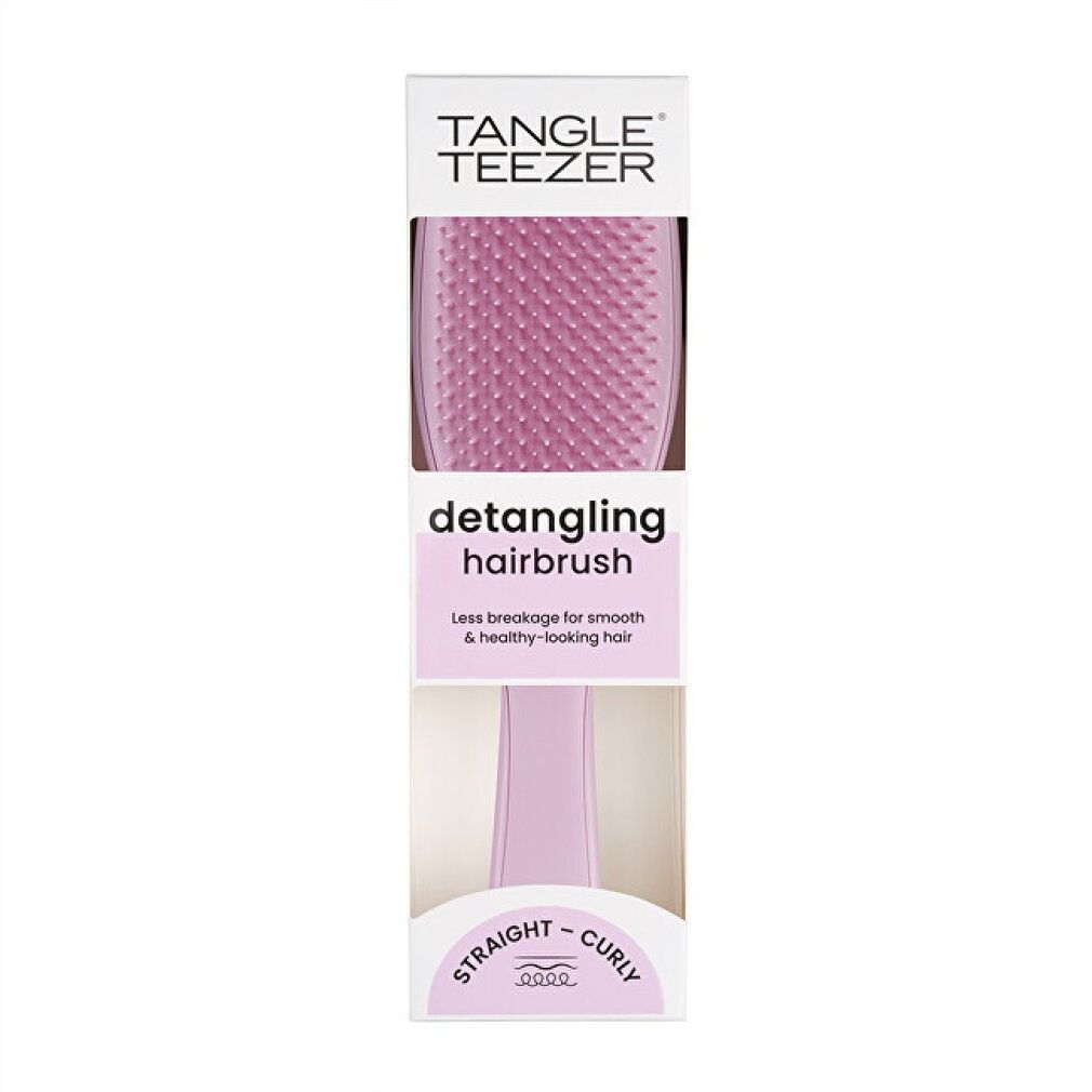 Spazzola per capelli nella confezione. Marchio Tangle Teezer. Testo: Detangling Hairbrush. Per capelli lisci e ricci.