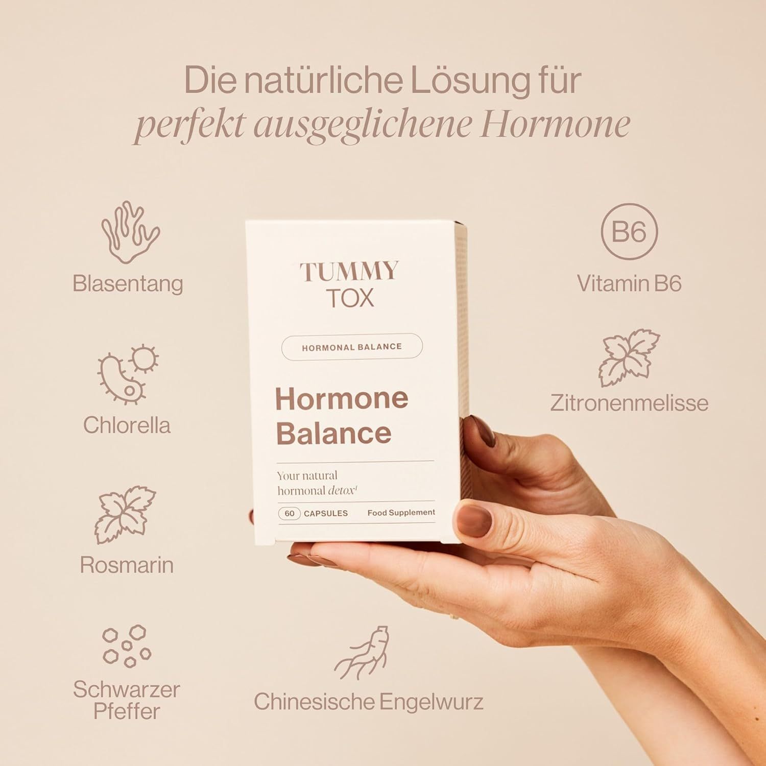 Una mano tiene una scatola bianca con scritto "Tummy Tox Hormone Balance". Illustrazioni degli ingredienti.