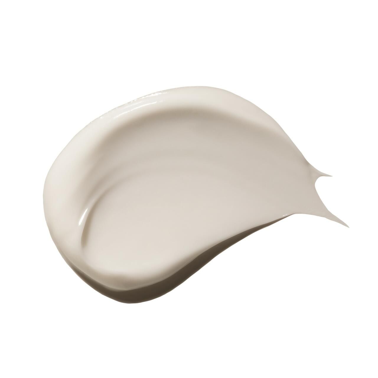 Crema spalmata. Texture chiara e cremosa. Su sfondo bianco.