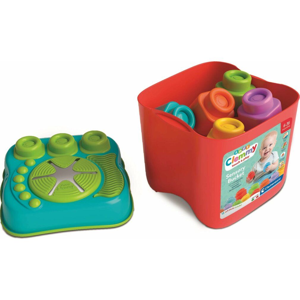 Due elementi del Clementoni Sensory Bucket: secchiello rosso con blocchi e coperchio con bottoni.