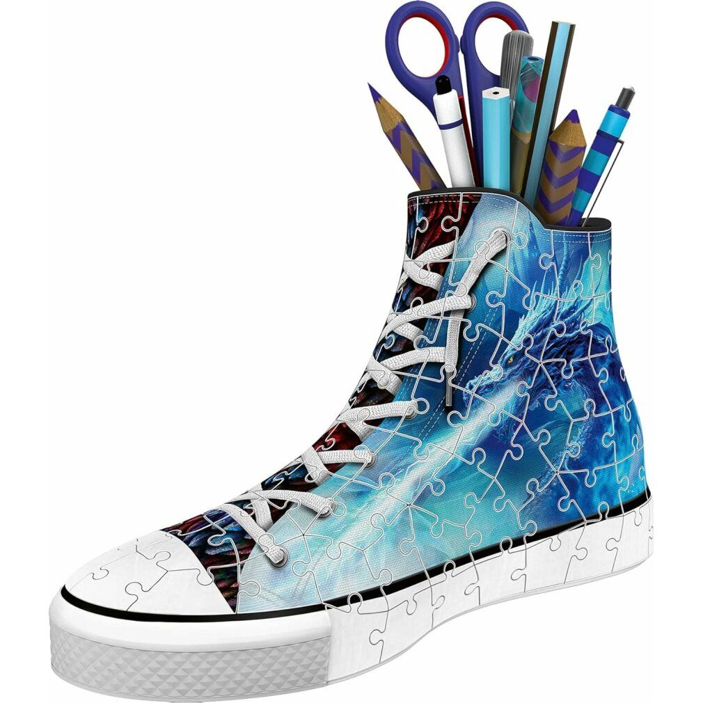 Sneaker puzzle 3D blu e bianco con portapenne. Contiene penne, forbici. Motivo puzzle, lacci, suola.