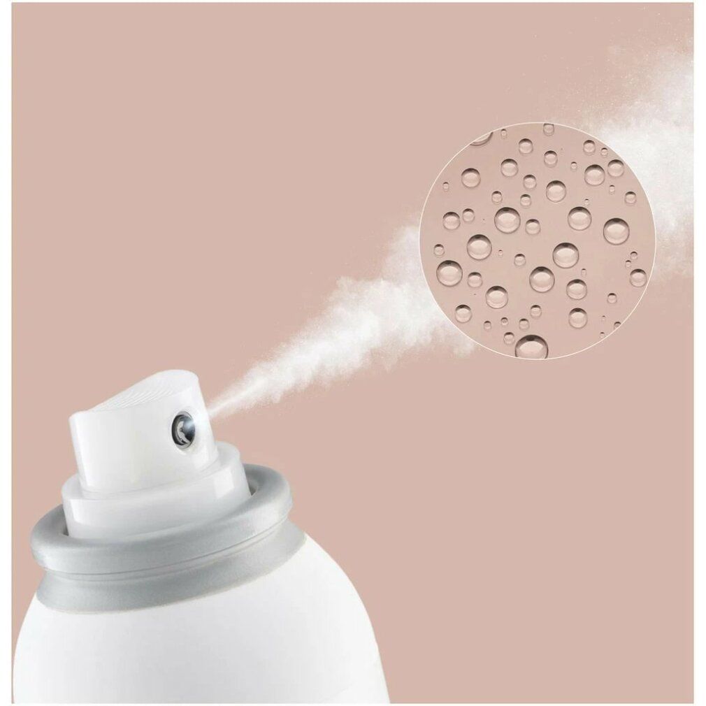 Primo piano di un flacone spray. Nebbia spray e rappresentazione ingrandita di goccioline d'acqua.