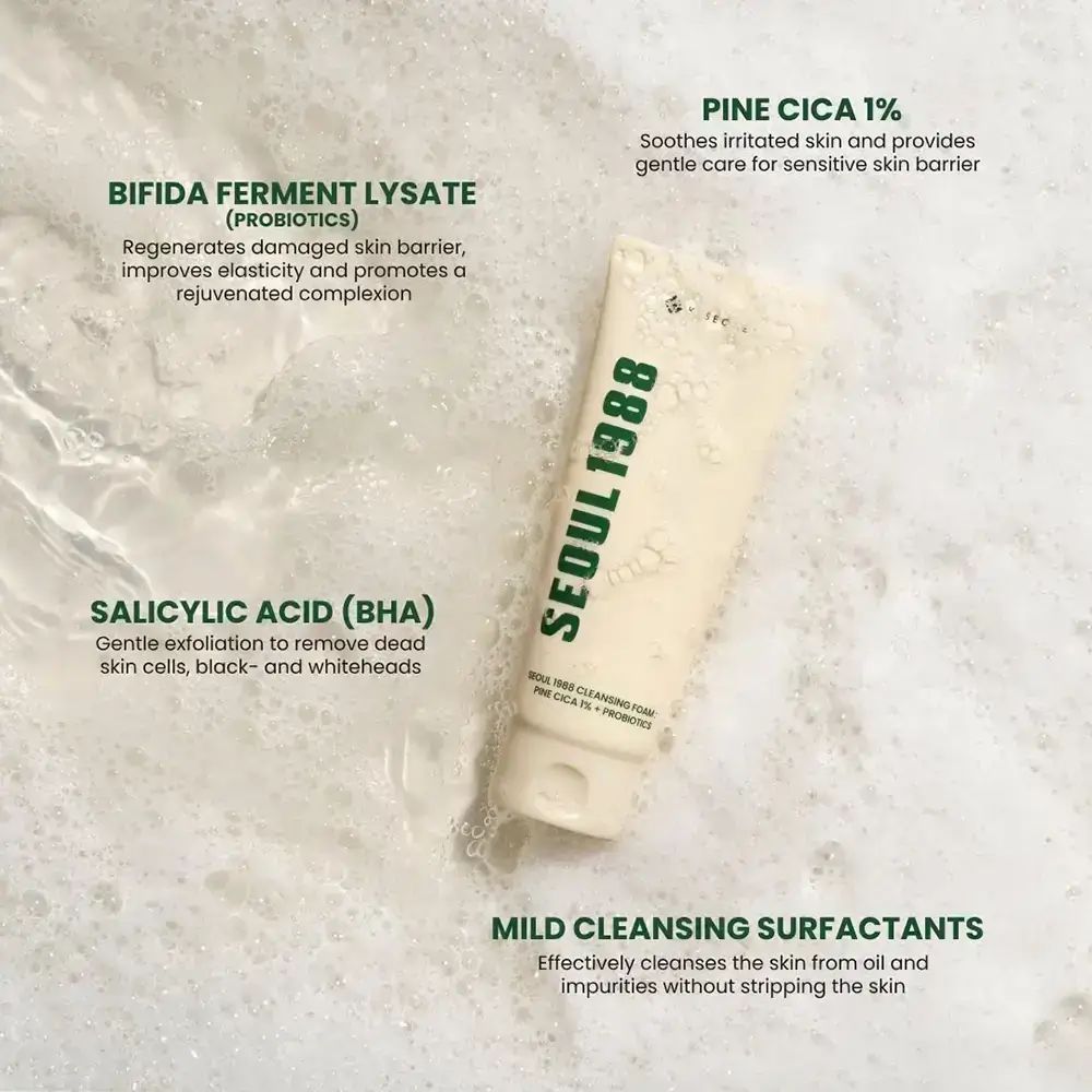 Tubo di crema in bolle di sapone. Scritta: SEOUL 1988. Testo: Pine Cica 1% + Probiotics. Testi aggiuntivi.