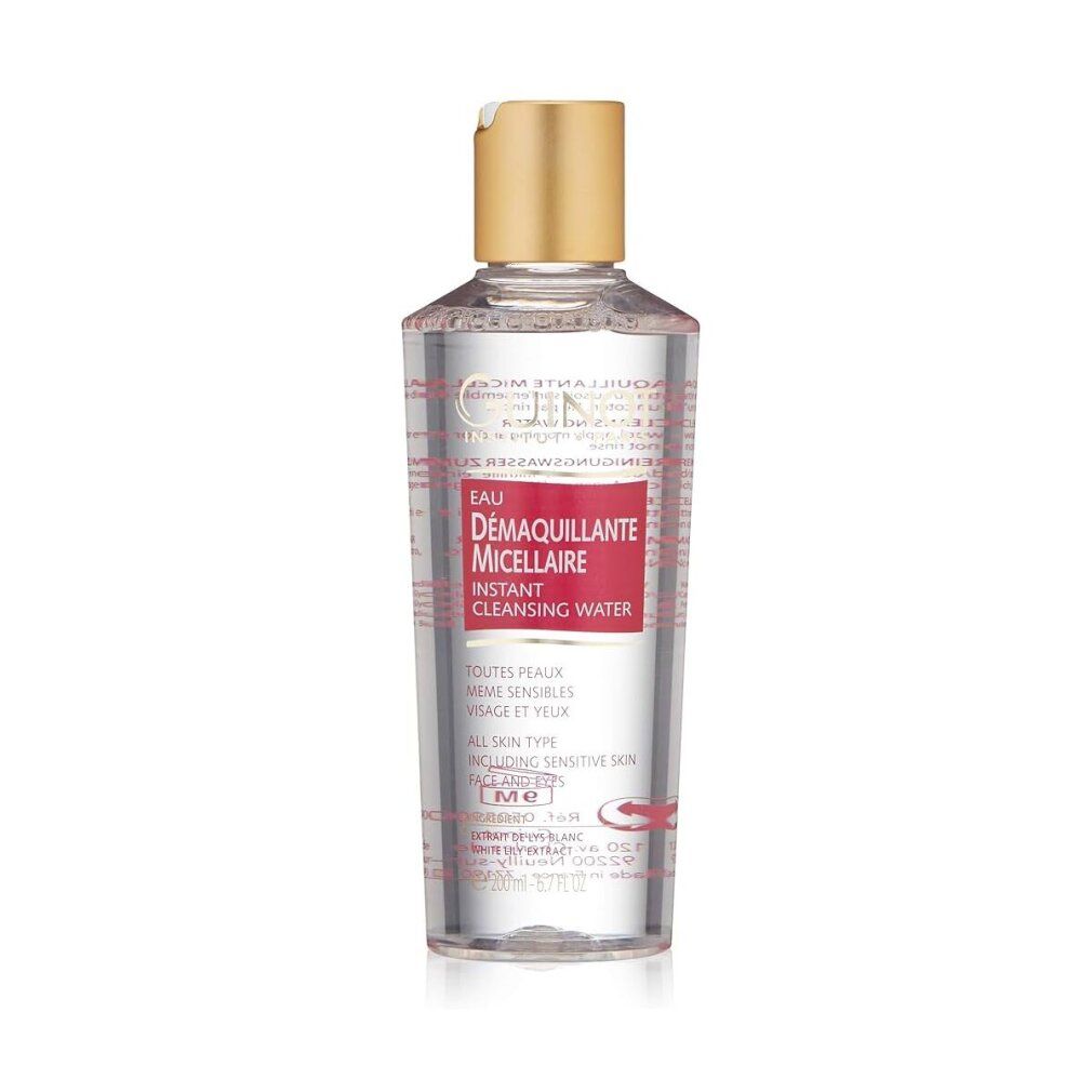Flacone trasparente con tappo dorato. Etichetta rossa con testo: Eau Demaquillante Micellaire Instant Cleansing Water. Logo Guinot.