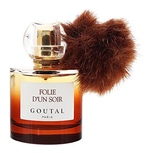 Flacone di profumo con pennello marrone. Scritta: Folie d'Un Soir, Goutal Paris. Flacone in vetro.