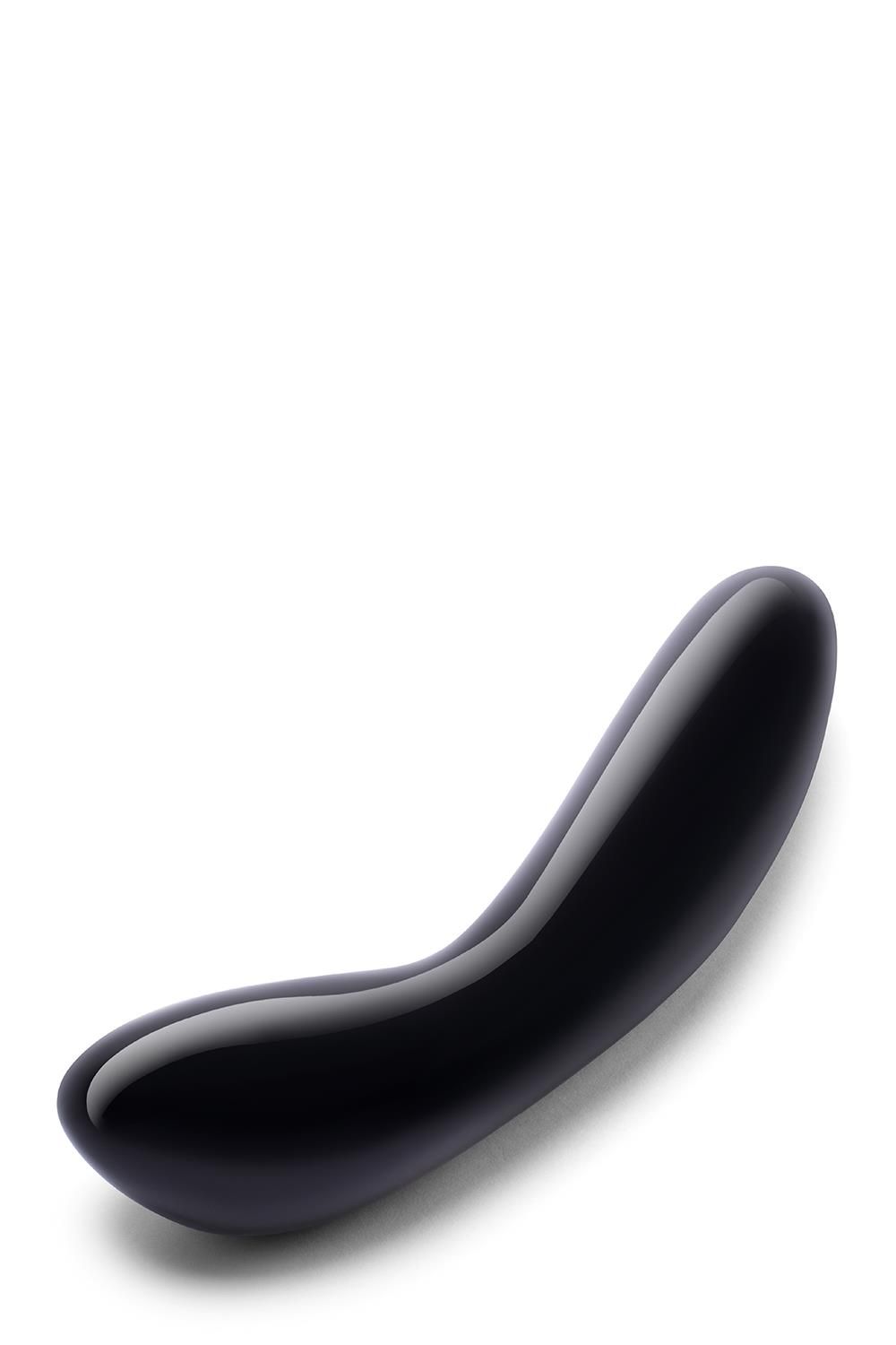 G-Wand nero curvo in ossidiana. Superficie liscia e lucida. Forma ergonomica.