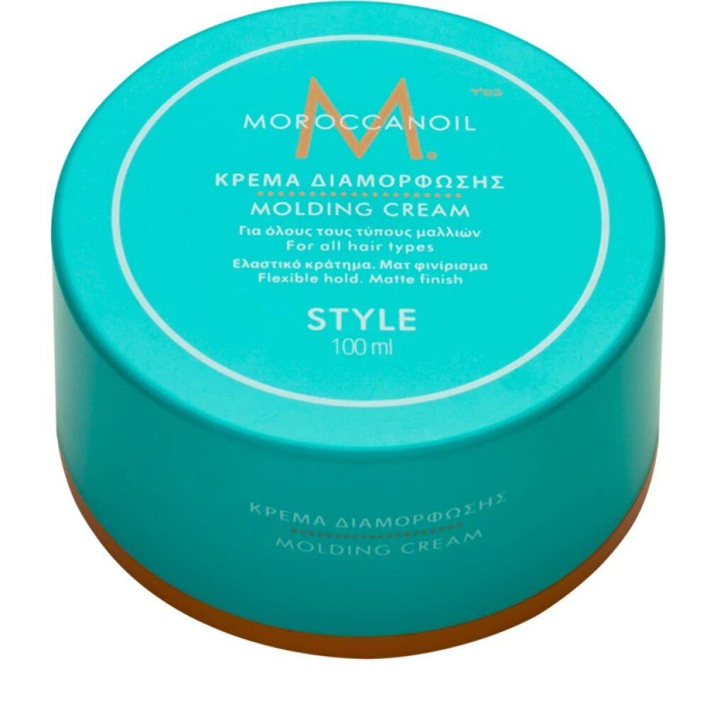 Barattolo turchese con coperchio bianco. Scritta: Moroccanoil Molding Cream. Bordo arancione. Testo: Style, 100 ml.