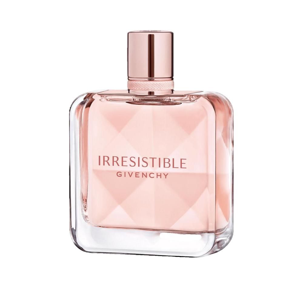 Flacone di profumo rosa. Forma quadrata con design sfaccettato. Scritta: Irresistible Givenchy.