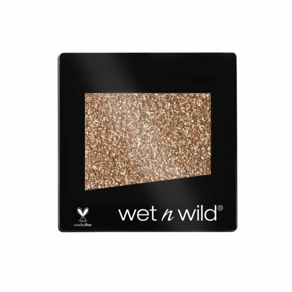 Ombretto glitterato dorato in confezione nera quadrata. Marchio "wet n wild" e logo Cruelty Free.